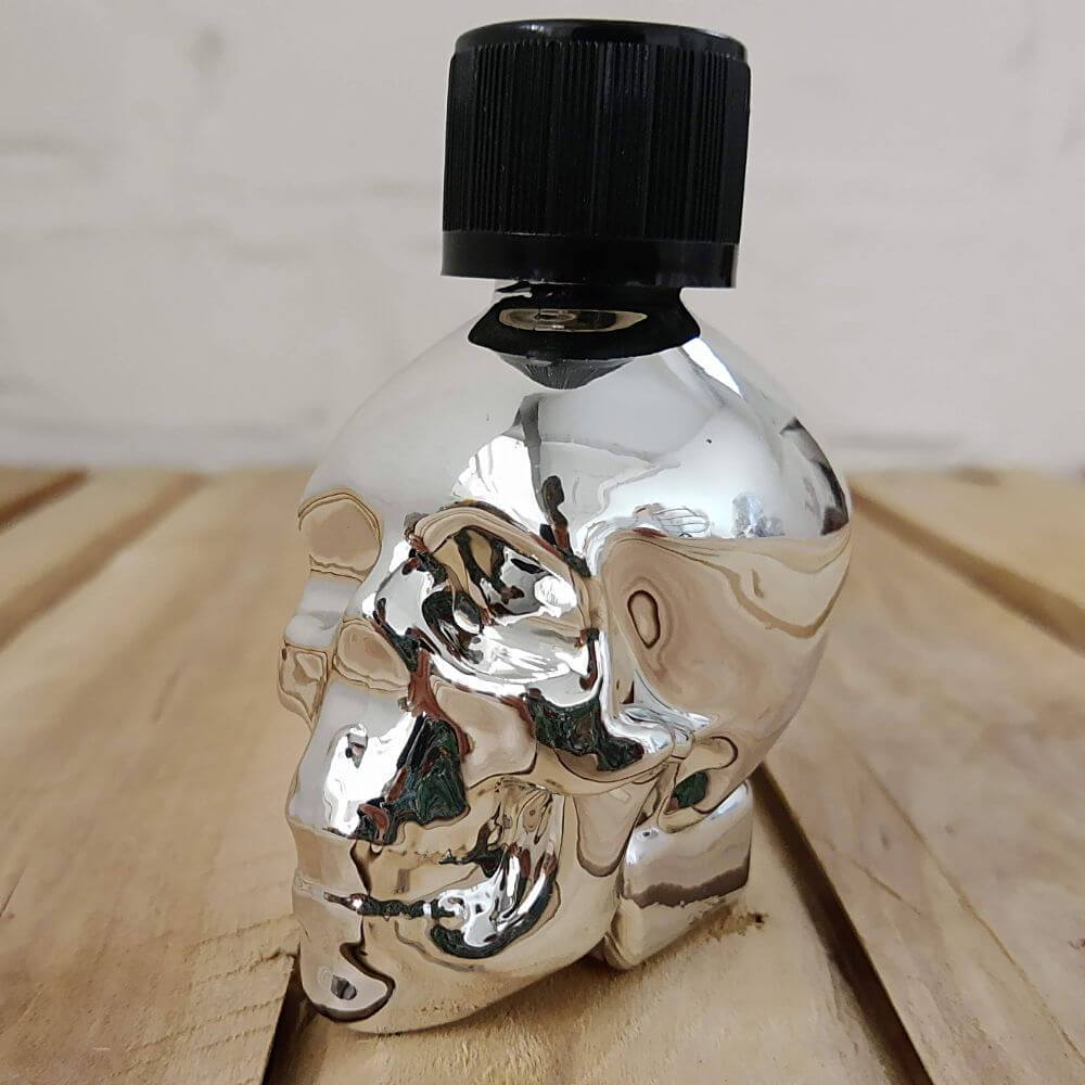 QuickSilver Skull Glass Bottle